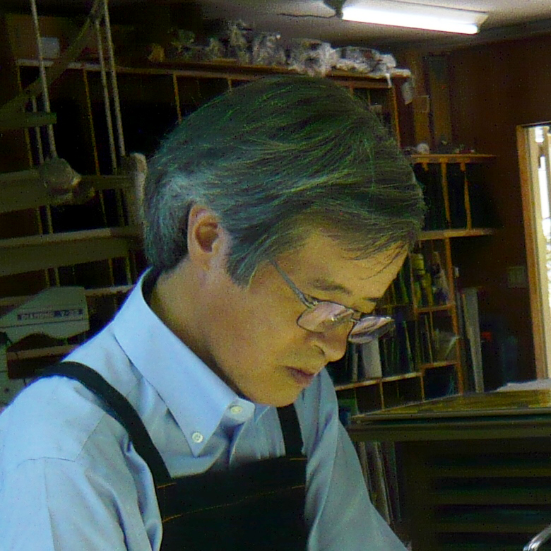倉島重友