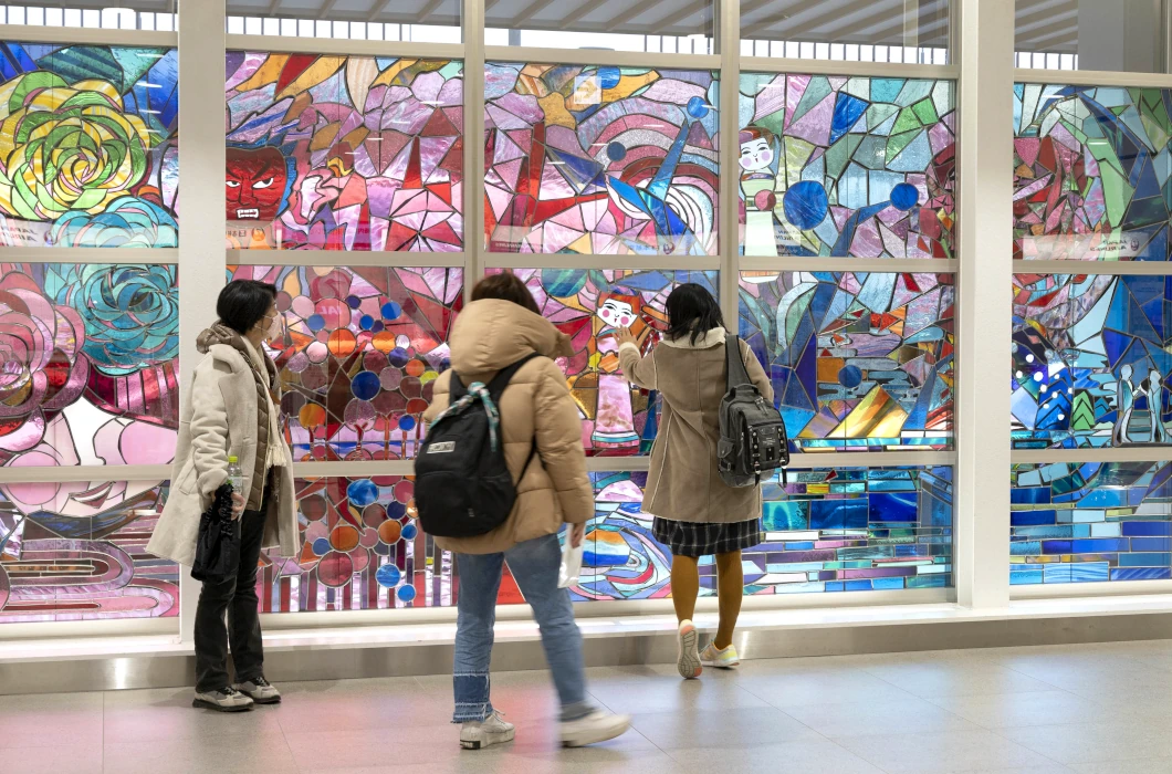 Detail of the stained glass artwork “To the Deep Blue Forests”