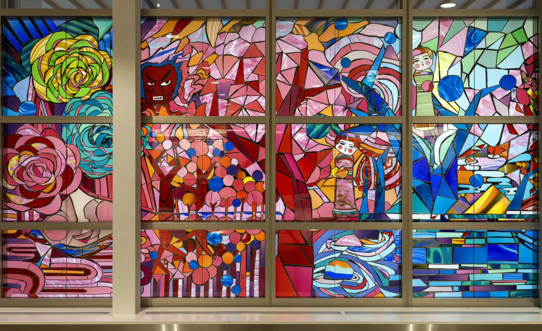 Detail of the stained glass artwork “To the Deep Blue Forests”