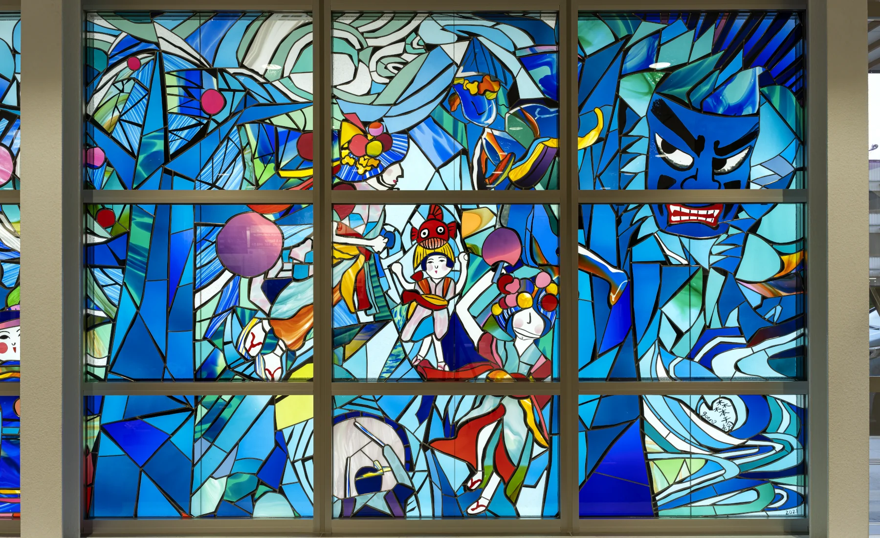Detail of the stained glass artwork “To the Deep Blue Forests”