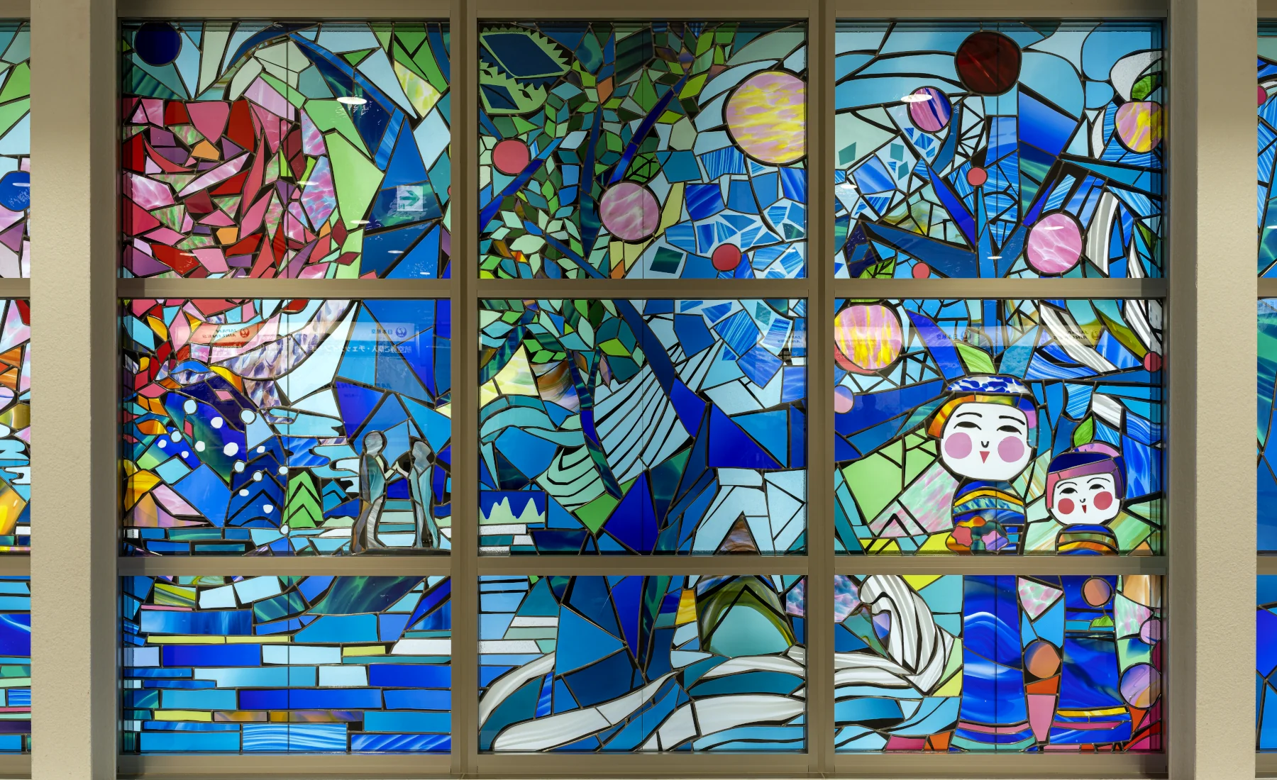 Detail of the stained glass artwork “To the Deep Blue Forests”