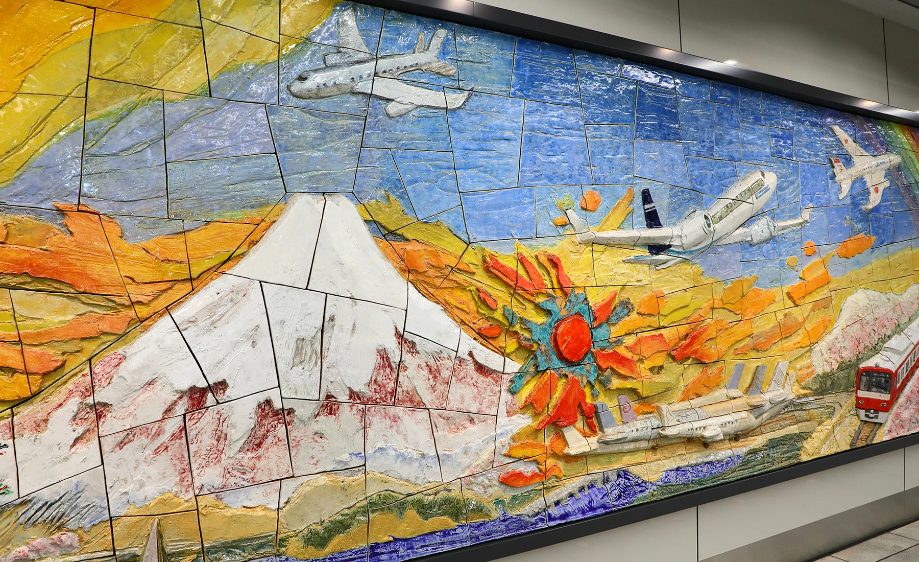Close-up of the Ceramic Relief artwork “Sparkling Hope, KEIKYU”