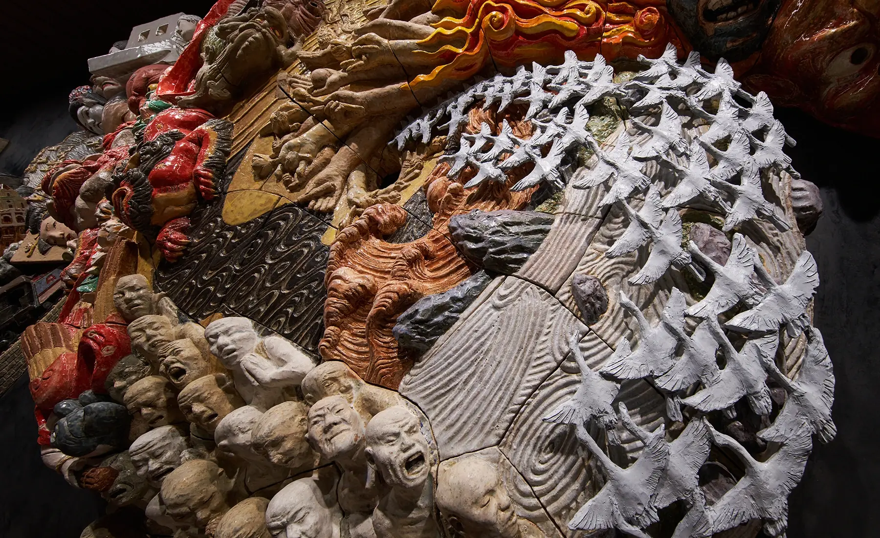 Detail of the ceramic relief artwork “Procession Spin”