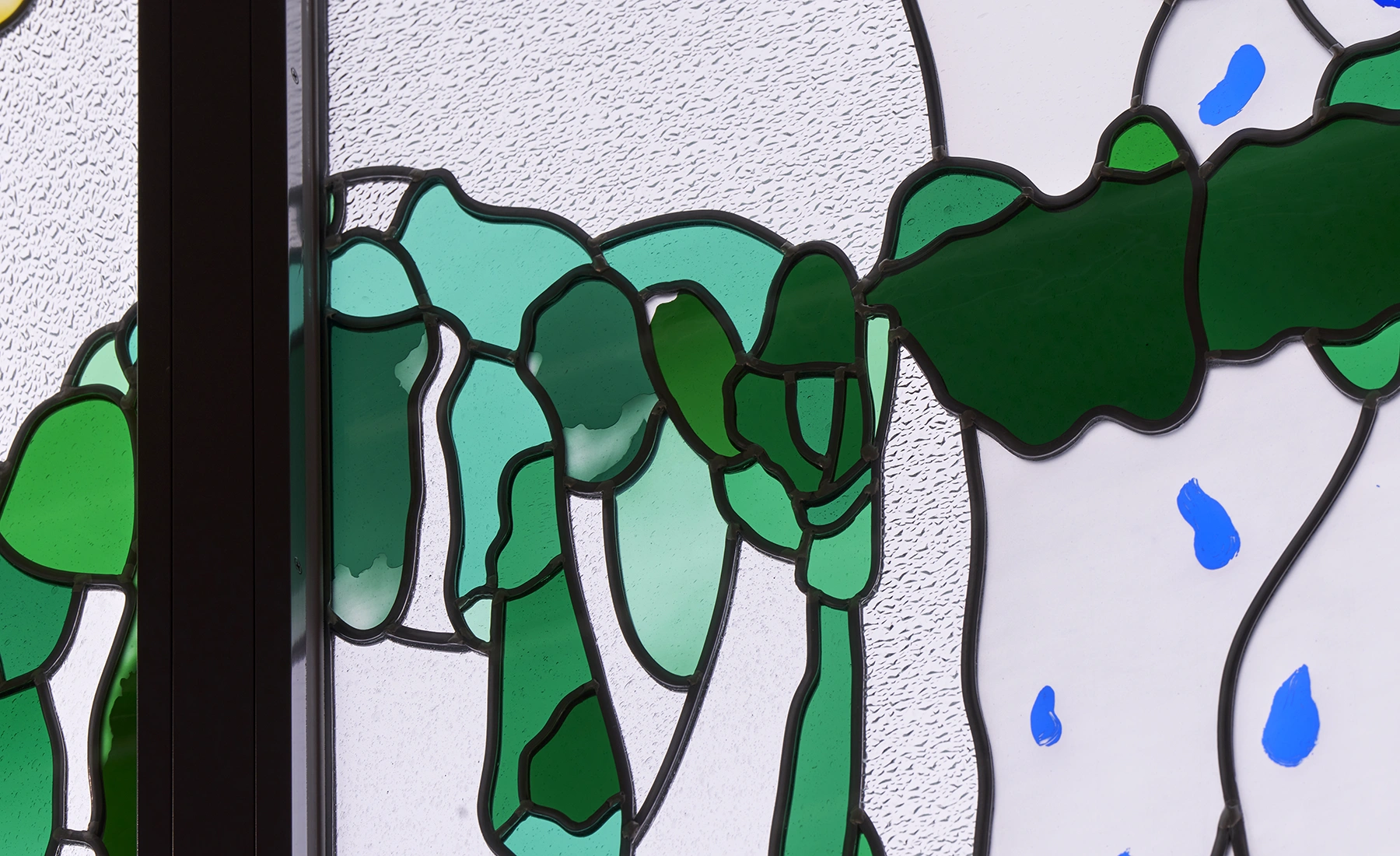 Detail of the stained glass artwork “The Root of Life”