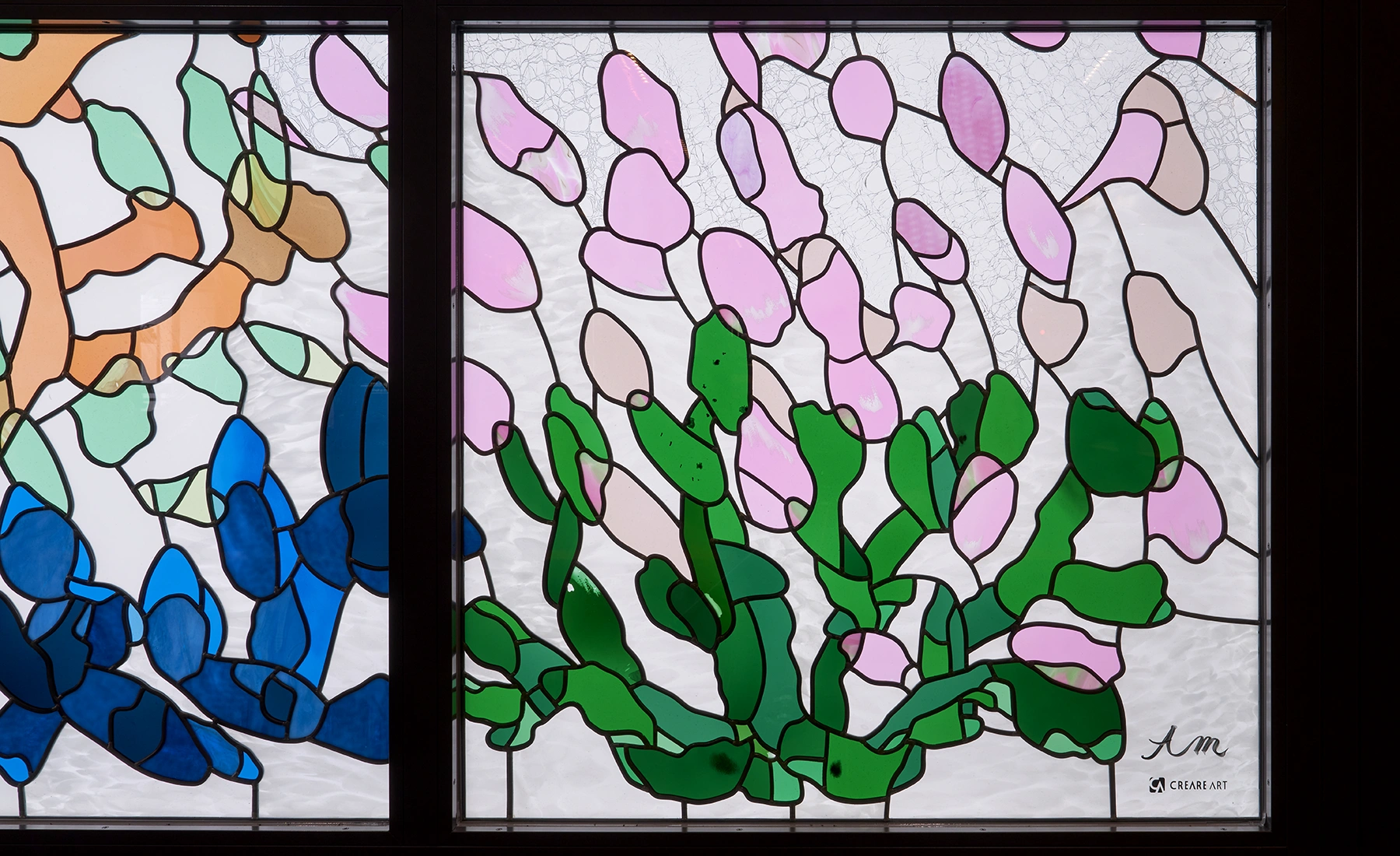 Detail of the stained glass artwork “The Root of Life”