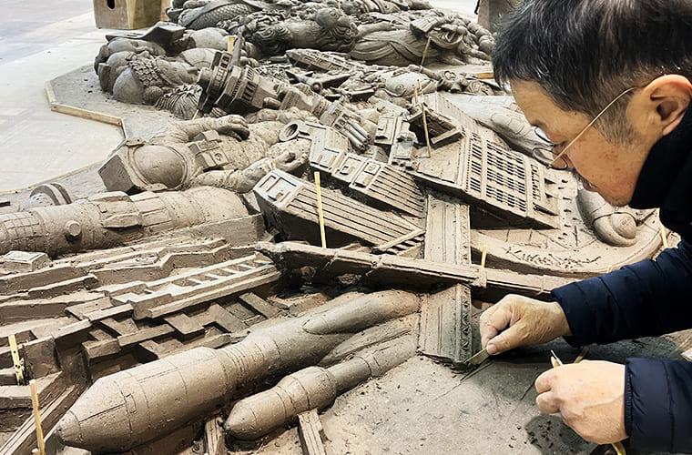 Sculpting the full-scale Ceramic Relief in clay