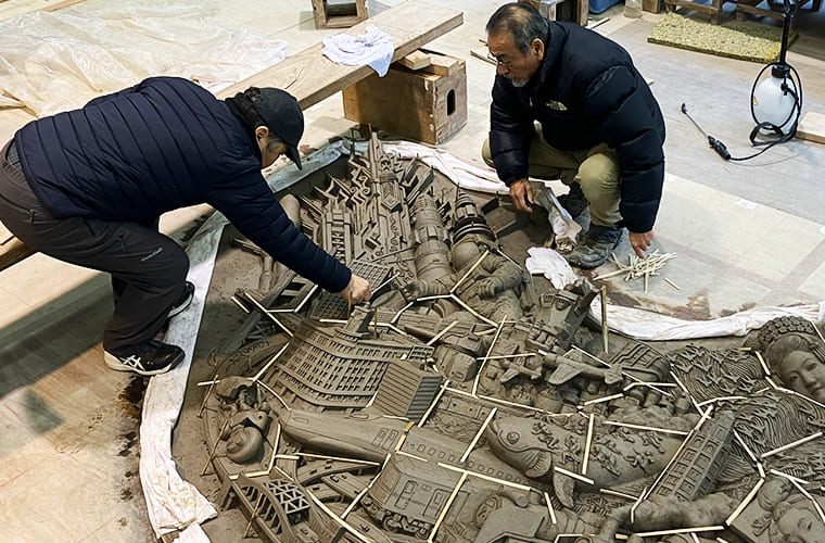 Dividing the clay relief and assigning a number to each piece
