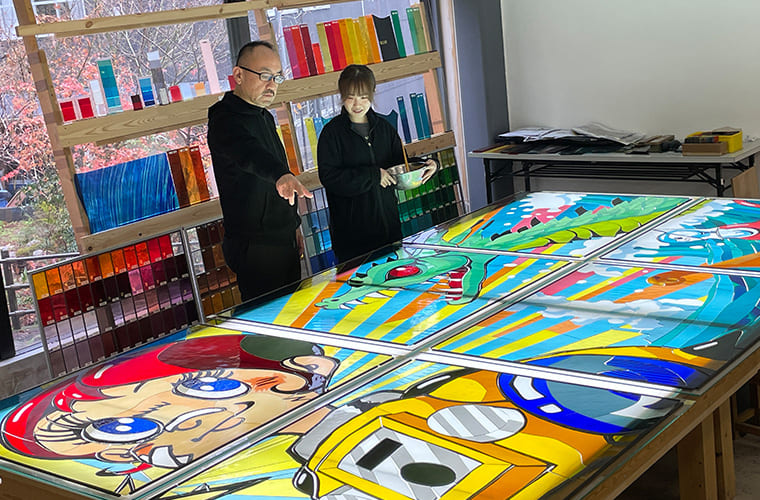 Arranging the cut and processed glass to check its colors and tones
