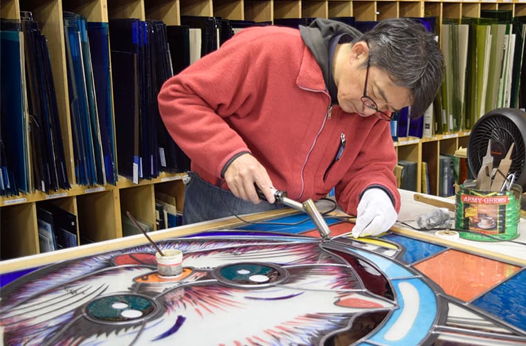 Joining the individual pieces of Stained Glass with lead came
