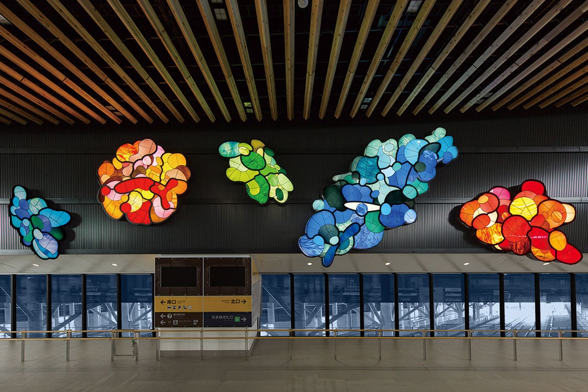 “Muku Muku - homage to water, light and earth,” installed at JR Hokkaido Shin-Hakodate-Hokuto Station and created through a collaboration of different materials and techniques