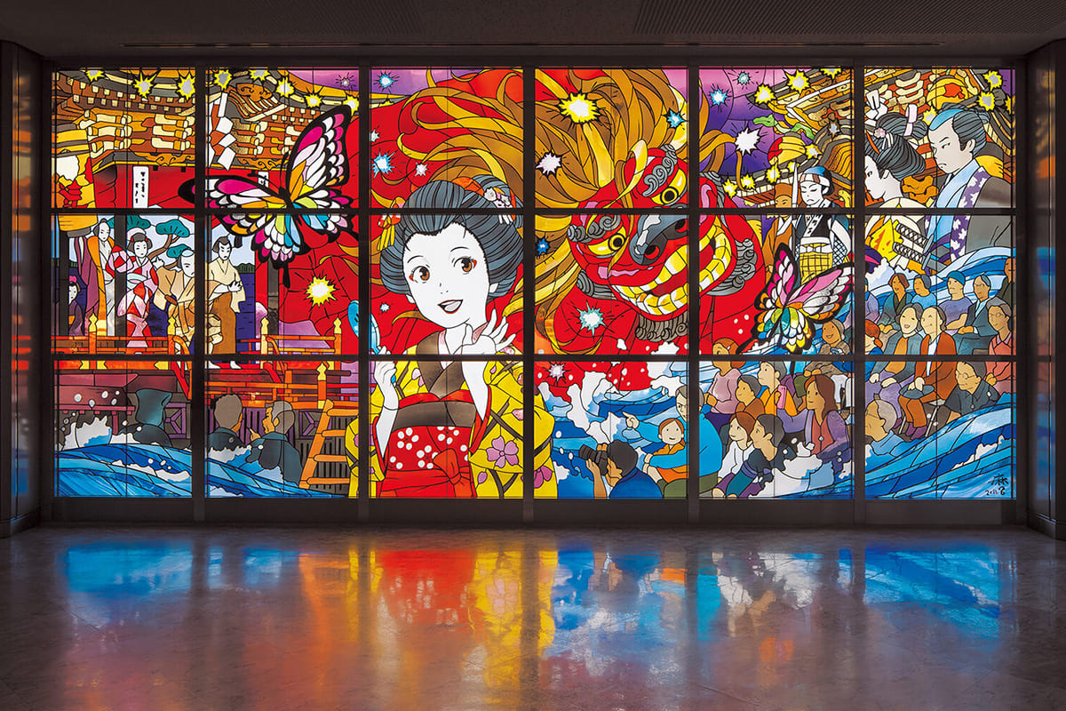 The Stained Glass artwork “Oojishi (Large Lion) Cavorting with Butterflies,” installed at Komatsu Airport and created from an Original Painting for anime and manga