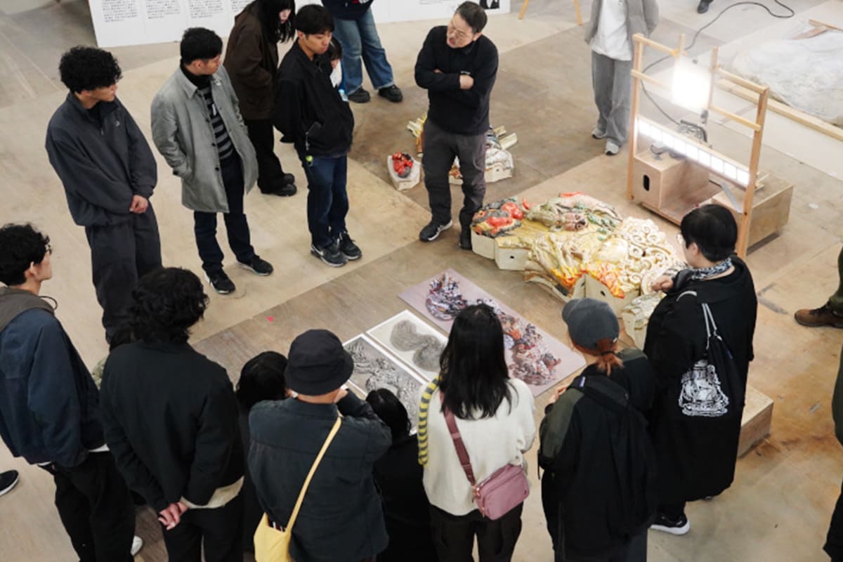 Visitors touring the Studio